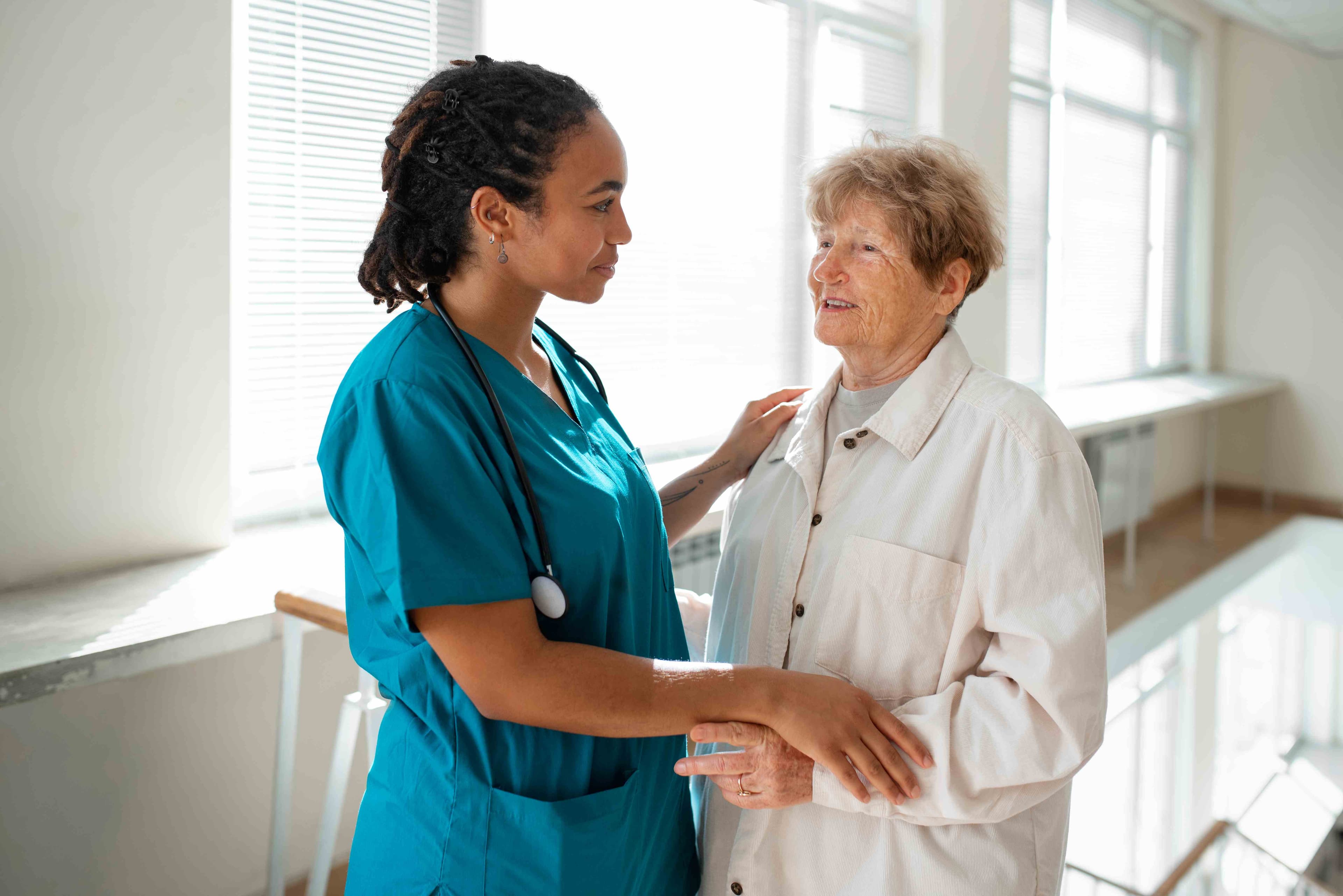 Patient smiling with nurse